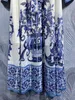 드레스 중간 길이 거짓 큰 밑단 드레스 2023 스프링 여성 레트로 라펠 긴 슬리브 파란색과 흰색 도자기 인쇄 핀 드릴 스팽글