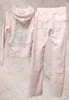 Marque de survêtement Femmes Pantalons deux pièces Hot Drillage régulier à manches longues à capuche à capuche haute trachette à crampons droits créateurs de mode femme de mode 6261977