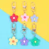 Porte-clés à fleurs de Style coréen, porte-clés de dessin animé pour fille, mignon, couverture d'écouteurs, sac à main, accessoires d'ornement