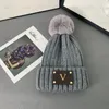 Designer Beanie Flower Label hoeden