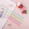 4pcs Cute Stocking Hat with Red Bobble Gel Pen 0.5mm Ballpoint Black Color Ink Pen Stationery Office School Supplies A6886