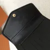 Portafogli firmati Borsa di lusso Portafoglio corto classico alla moda Borsa a busta mini Porta carte di credito con fibbia pieghevole Design del modello dei cartoni animati