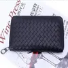 Whole Fashion Men's walletl En cuir de mouton Nappa Zip Around Wallet Sac à main Première classe en cuir véritable Long Wallet Go270u