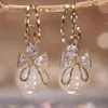 Boucles d'oreilles à tige mode tendance cristal Zircon nœud pendentif femmes fête fille Imitation perle balancent luxe bijoux cadeau