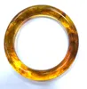 Bangle 58-65 mm 0 Certified Natural Mexico Gele Amber bijenwasarmband