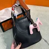 حقيبة مصممة العلامة التجارية 10A حقيبة يد ناعمة للجلد الصغير الخنازير الأنف الخضار سلسلة Crossbody Bag Intheloop Numbe178W