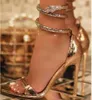 Sandały Kobiety Złoty wąż owinięta dzika przychylona palca na wysokim obcasie luksusowe damskie buty letnie buty 12 cm stiletto t221209