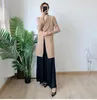 Kvinnors trenchrockar ChangPleat Women Miyake Pleated Fashion Solid Single Button High Street Loose Large Size Female Long Sleeve