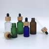 Depolama Şişeleri 10 PCS 5/10/15/20/30/50/100 ml Bambu kapak kapak pipet damlası şişe doldurulabilir Kalın Mat Cam