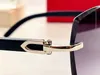 Nuovi occhiali da sole di design alla moda 0052 montatura senza montatura lenti a taglio quadrato irregolare occhiali di protezione uv400 per esterni in stile semplice e popolare