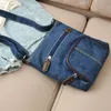 Sacos de armazenamento Moda Bola de jeans pequena feminina designer de bolsas femininas bolsas de bolsas Jean Tote ombro Crossbody messenger