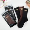 Mode chaussettes coton femmes mi-long style étranger haute qualité pile vintage chaussettes tendance 3 paires à acheter