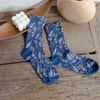 Vrouwen sokken 3D in reliëf middenbuisstapel voor retro reliëf Japanse winter warme vrouwelijke losse hoge sok