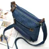 Sacos de armazenamento Moda Bola de jeans pequena feminina designer de bolsas femininas bolsas de bolsas Jean Tote ombro Crossbody messenger