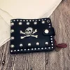 Europe and the United States retro tide men's portable wallet skull personality new rivet trade short paragraph black wallet264i