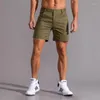 Shorts Shorts Summer Jogging Man Sport Pants Short Gym Dry Cargo Pocchi di allenamento maschi