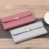 Los fabricantes que venden New Lady Long Wallet metal treinta por ciento love joker Japón y Corea del Sur versión del bolso de mano más scr3029