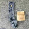 Chaussettes de serviette pour hommes et femmes 2023 Mode Marque américaine Carhart Hommes Automne Hiver Nouveau Nord Femmes Bas Sports Tall Gold Label Broderie Tie Dyed 5366