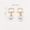 18K Gold Projektanci Marka Kolczyka projektant Letter Ear Stud Kobiety Kryształ Pearl Geometryczne kolczyki na przyjęcie weselne Akcesoria Er0008