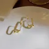 Nowy projekt nieregularne złote kolczyki w kształcie litery U dla kobiety biżuterii modowej Niezwykłe akcesoria dla dziewcząt na Halloween