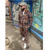 Män spårningsdräkter Leopard kostym 2 stycken sportdräkter europeiska amerikanska trender 3d tryck blixtlås slim casual set modesuit män s312x