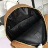 Top new fashion Korean version M punk rivet backpack men and women student bag travel backpack 5716217e