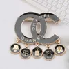 Women Brand Designer Double Letter Brooches Black Tassels Pendant Rhinestone Diamond Crystal Circle Metal Brooch Suit Laple Pin Fashion Women Jewelry Accessories