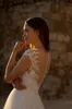 Abiti da sposa in pizzo bohémien A Line Beach Romantic Plus Size Applique Tiered Tulle Sweep Train Pieghe Abiti da sposa Boho Custom Made