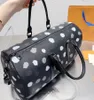 Designer doodle Unisex Duffel Bags Printing Leather Handbag Large Capacity Fashion Leisure Travelling Bag classic dot Women Single-Shoulder Bag