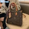 Wholesale ladies shoulder bag 2 color simple large-capacity printed handbag elegant atmosphere ribbon tote bag multifunctional leather backpack 2902# Small