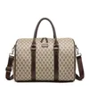 2021-Designers sacs polochons 50CM luxe grande capacité voyage haute qualité femmes hommes en cuir véritable épaule mode sac carr228D