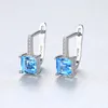 Topaz Studörhängen S925 Silver Four Claw Aquamarine Zircon Luxury örhängen europeiska mode kvinnor avancerade örhängen bröllopsfest smycken valentins dag present SPC