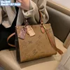 Wholesale ladies shoulder bag 2 color simple large-capacity printed handbag elegant atmosphere ribbon tote bag multifunctional leather backpack 2902# Small