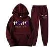 Мужские спортивные костюмы 2023 бренд Trapstar Printed Sportswear Men 15 Colors Теплые две части складывают брюки для толстовки с капюшоном.