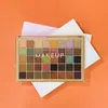 Partihandel 40 Color Eye Shadow Palette European USA Fashion Eyes Makeup Tools Set Matt Shining Highlight Eyeshadow