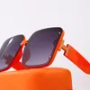 lunettes de soleil design hommes lunettes de soleil pour femmes femme plaque cyclone monture ultra-épaisse lentille UV400 d'une seule pièce cristal à quatre feuilles avec boîte orange étui bleu8598