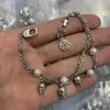 Cadena de doble capa, pulseras con colgante de calavera de perlas, esqueleto de calavera de oro y plata, brazalete lujoso de amor eterno para mujer MEB1K07250o