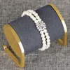 Naszyjnik Zestaw Trendy podwójny rzędowy Pearl Frędzanie 4PCS dla kobiet przyjęcie weselne Pełny cyrkon Dubai Bridal Jewelry Gift