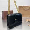 Bolsas de ombro de bolsa dobrável em corrente Bolsas de ombro mulheres Bolsas de mensagens de fivela de fivela de fivela de fivela moda moda letras de flores antigas intervalos internos de marca famosa sacos de marca