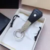 Luxury Designer classic Key Rings fine steel Car Keys Ring Two Layer Calf Chain With Cross Print Top Gift190y