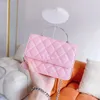 Toppdesigner handväskor axelväskor på 2023 New Women's Fashion Ringer Mini Tote Bag Multifunktionell bärbar korsbyggnadspåpa Fabriksfabrik Direktförsäljning