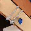 Orecchini pendenti di lusso Space Shooter Designer Full Crystal Quadrifoglio Nappa Catena Goccia per le donne Gioielli da sposa Spose Regalo per feste con scatola