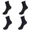 Herrstrumpor 1Pair Solid Color Cotton Tube M￤n kvinnor Ins Tide Street Wear All-Match Black White Sports Long Girls Sock