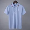 2023Designer Fashion Top Business Roupas Polo Heros Detalhes de colarinho bordado Camisa de pólo de manga curta