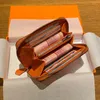 財布女性の短いトーゴ革のコインバッグジッパーとマルチカードポケットの女性用財布デザイナーウォレット
