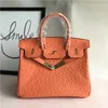 Diseñador de bolsos de platino Ostrich Bolsa de patrón de moda Portable Un hombro que inclina a la piel de vaca de cuero genuino de color naranja para mujeres