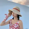 Cappelli a tesa larga Rafia Cappello da sole estivo da donna Paglia intrecciata a mano Moda femminile Ombra Pieghevole Berretto da spiaggia Boemia Panama Viaggi