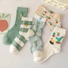 Chaussettes de couleur verte pour femmes, nouvelle mode 2022, imprimé de dessin animé mignon, Style collège Kawaii, douces filles, équipe d'étudiants