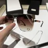 Diseñador de moda Gafas de sol sin montura Letras entrelazadas Icono Gafas de sol Personalidad Hombres Mujeres Anteojos con caja