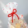 Enrolamento de presentes 50pcs/conjunto de saco plástico Padrão de coração Favor de casamento Festas de aniversário Bolo de bolo de bolo de bolsas de doces Packing Suppli